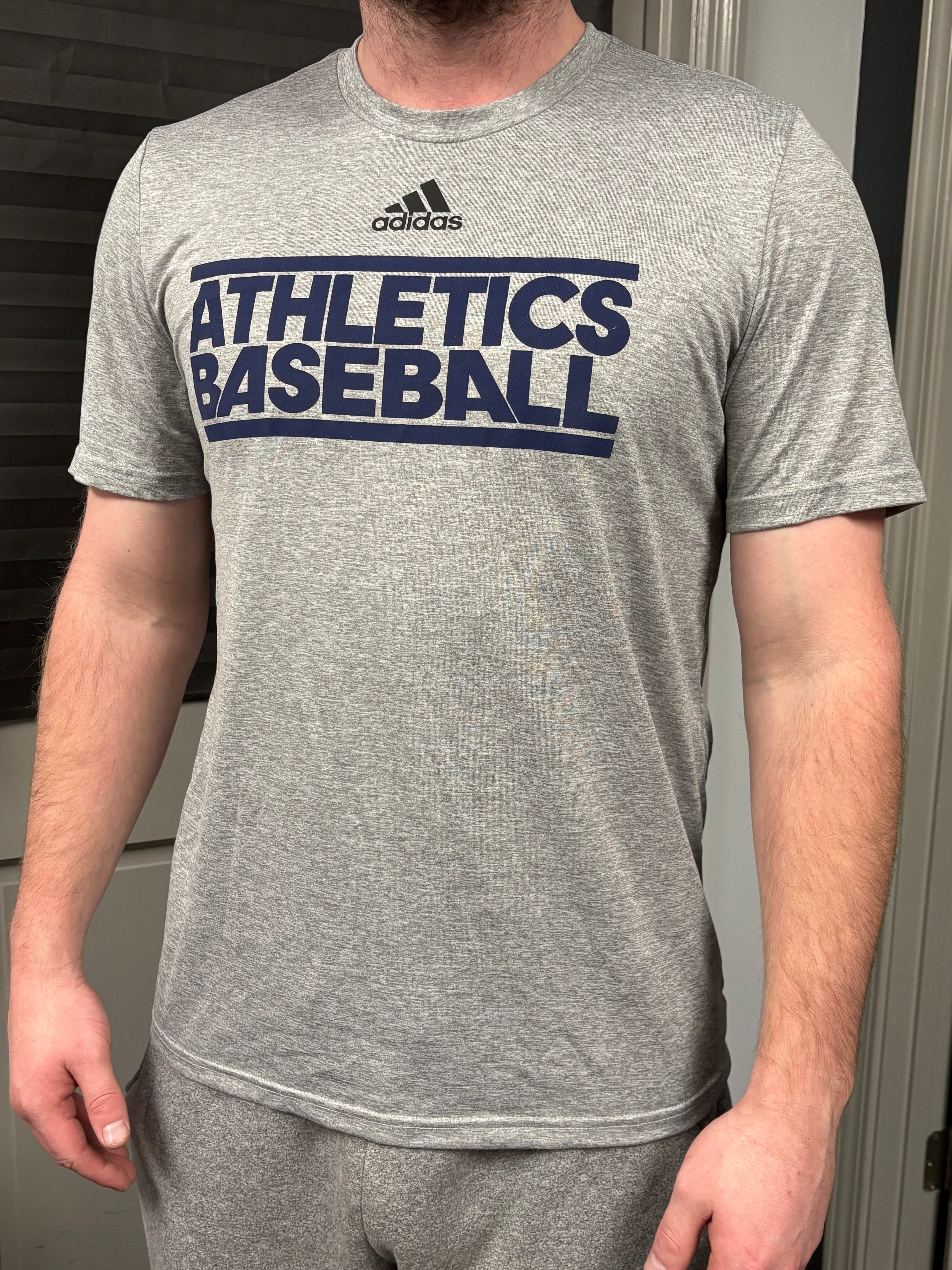 Gray training shirt (navy printed front)
