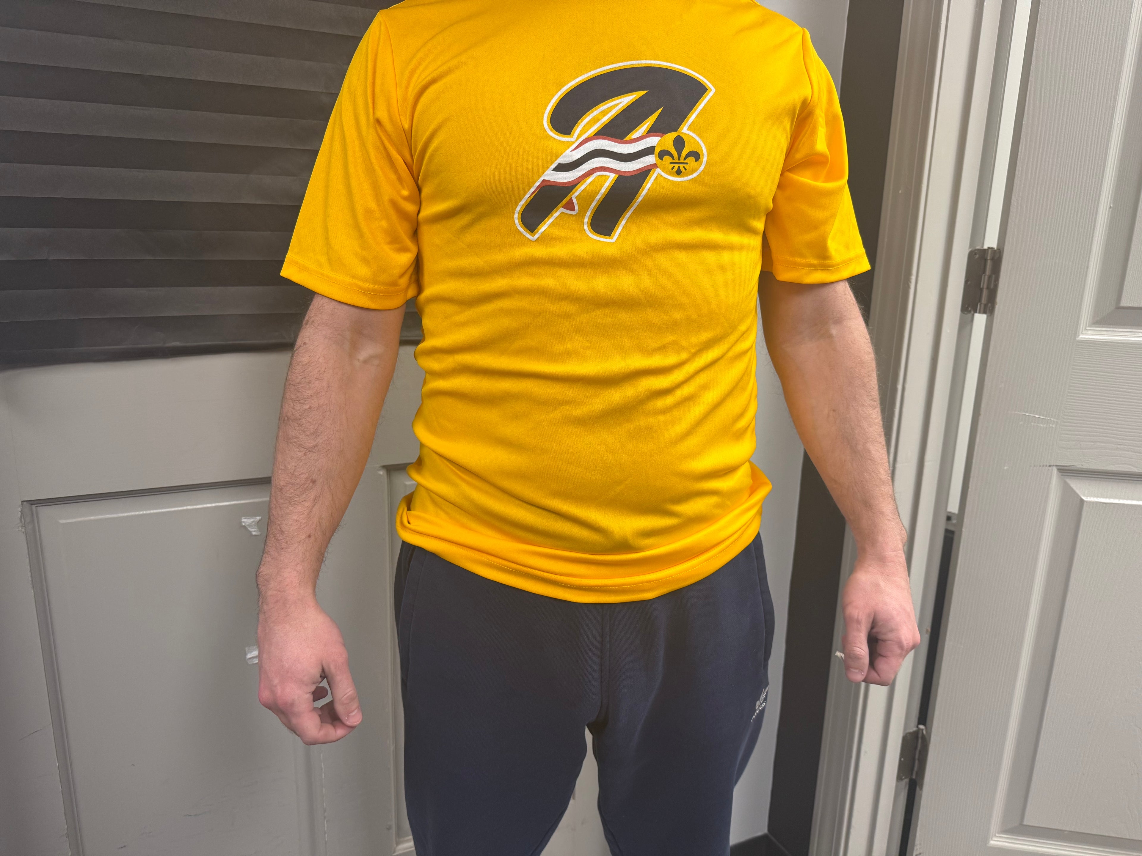 Yellow A's traning shirt